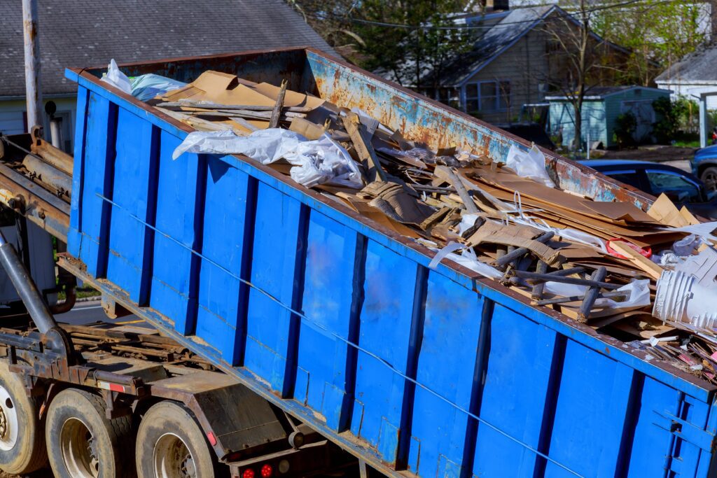 recycling garbage collector truck loading removable container waste and trash